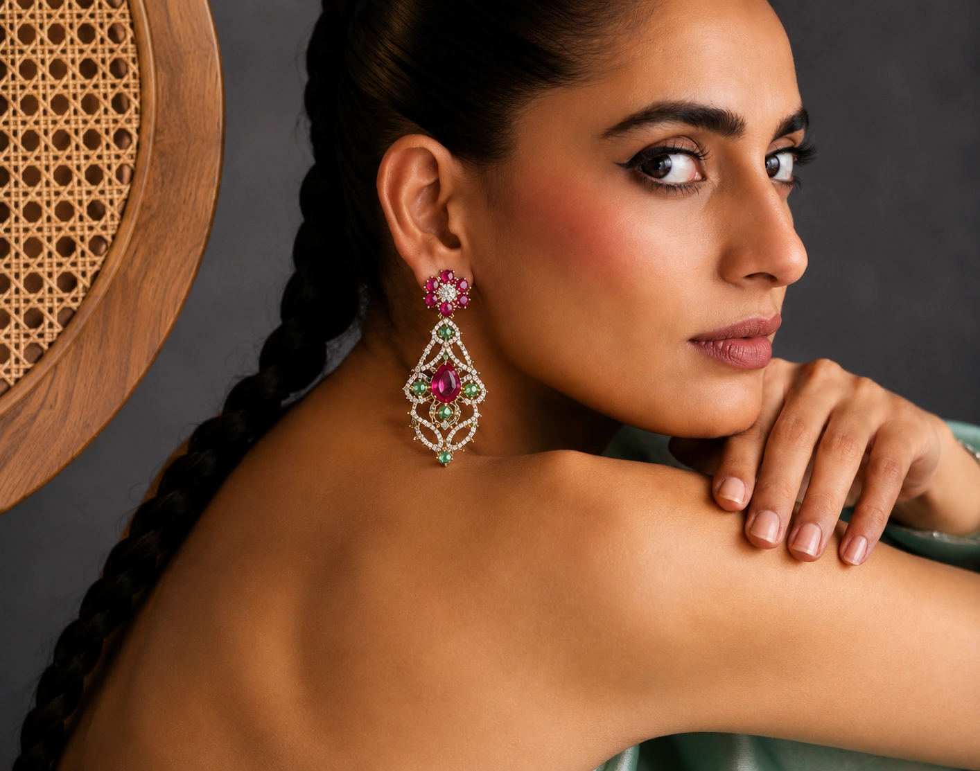A master jeweler's hands meticulously working on a magnificent high-end jewelry piece